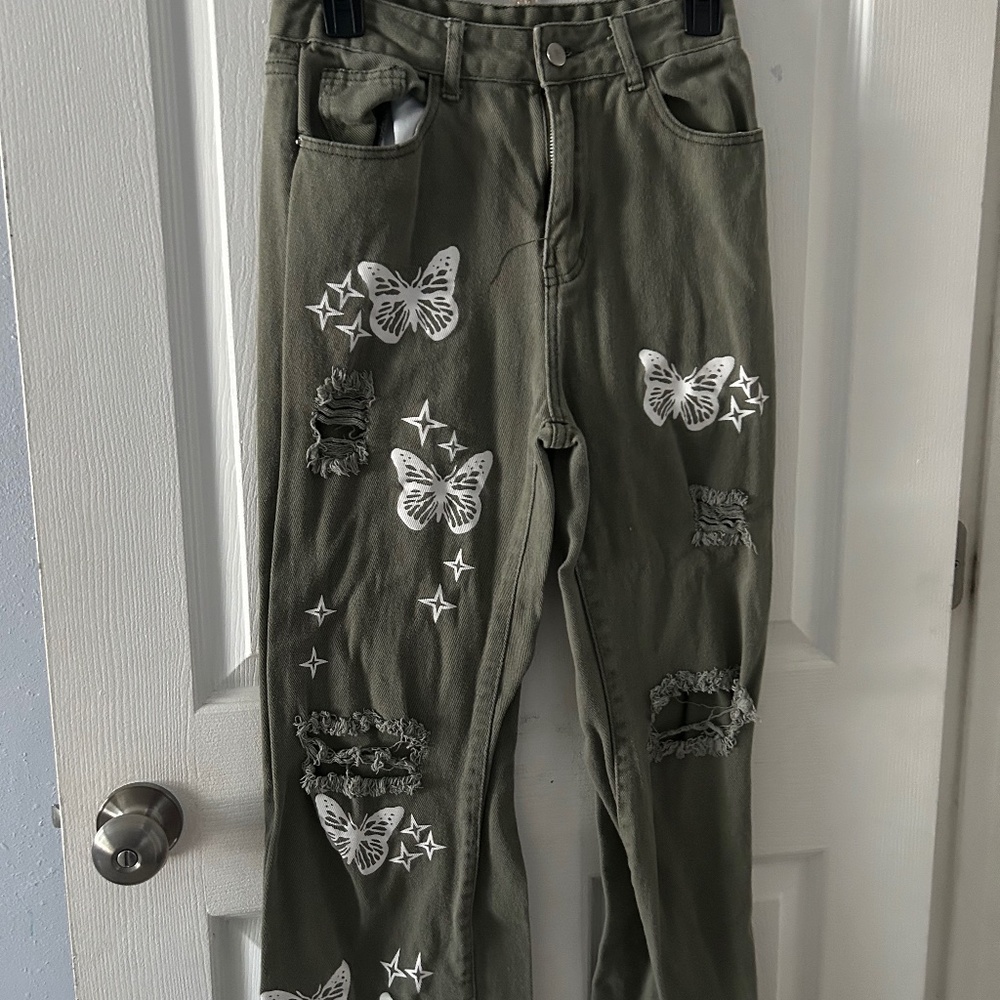 Army green ripped jeans